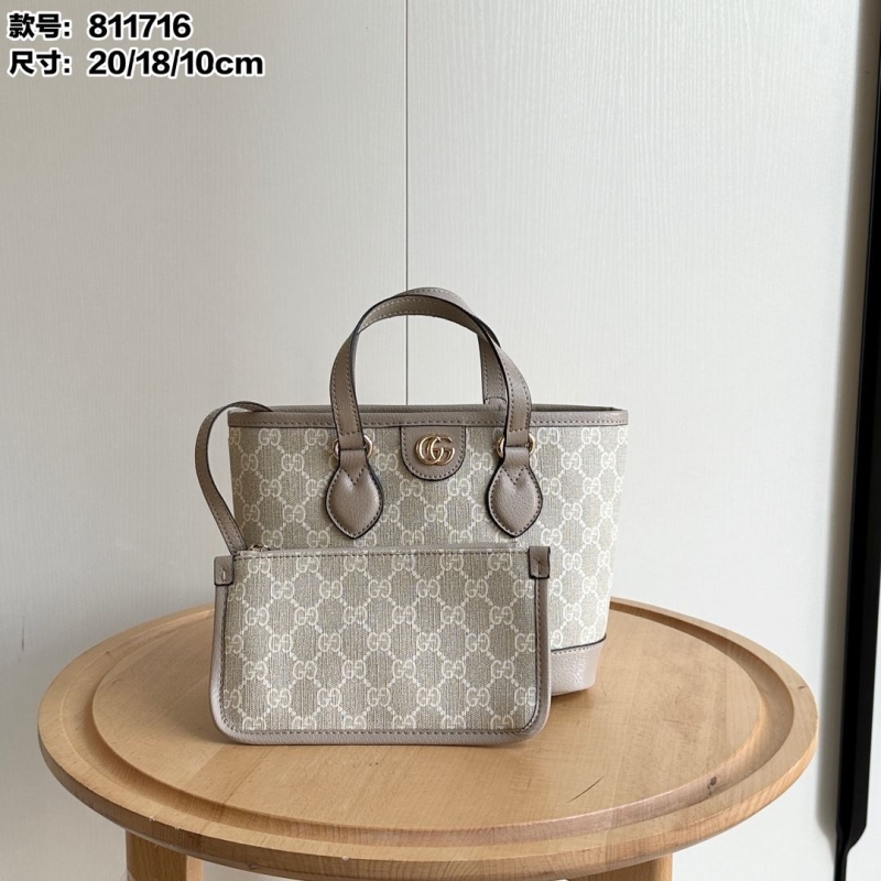 G*u*i shopping bags